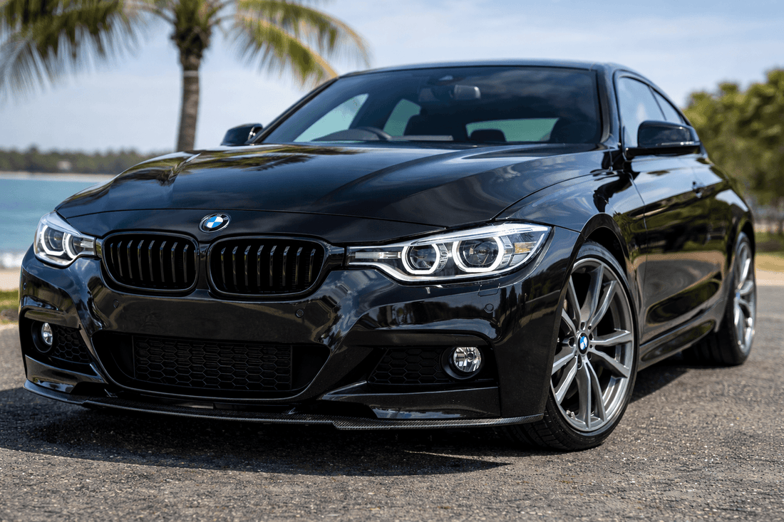 shiny and well presented black vehicle prepared for sale